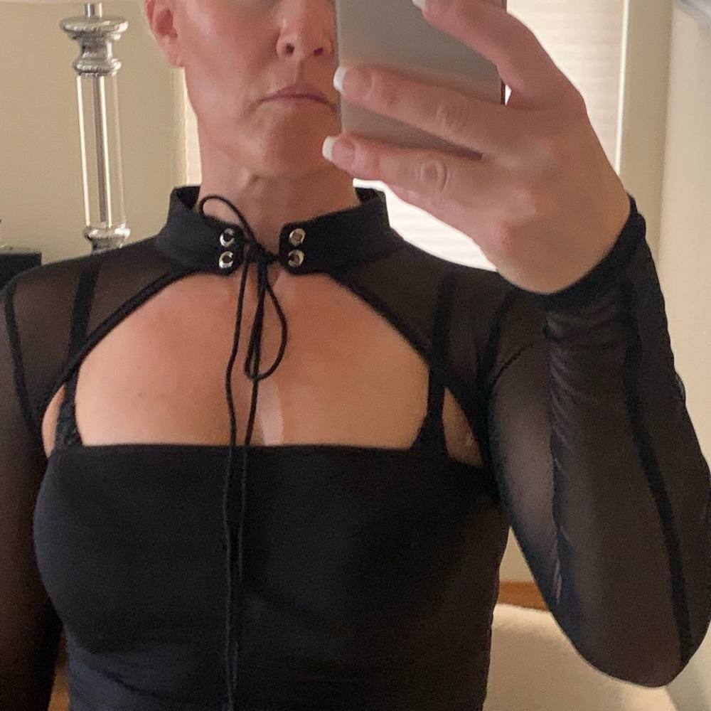 Sexy black bodysuit. Sheer arms and laced choker neck
